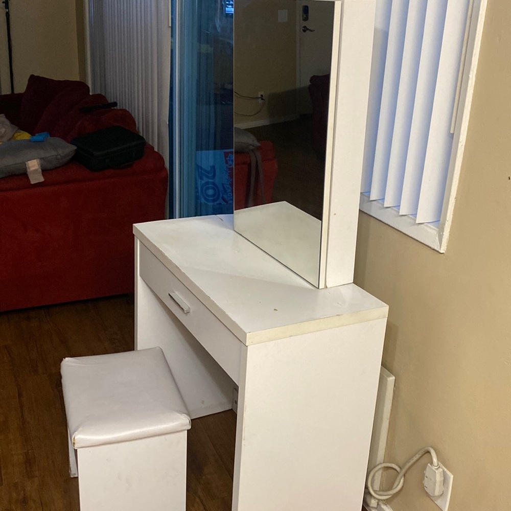 Vanity with mirror and chair